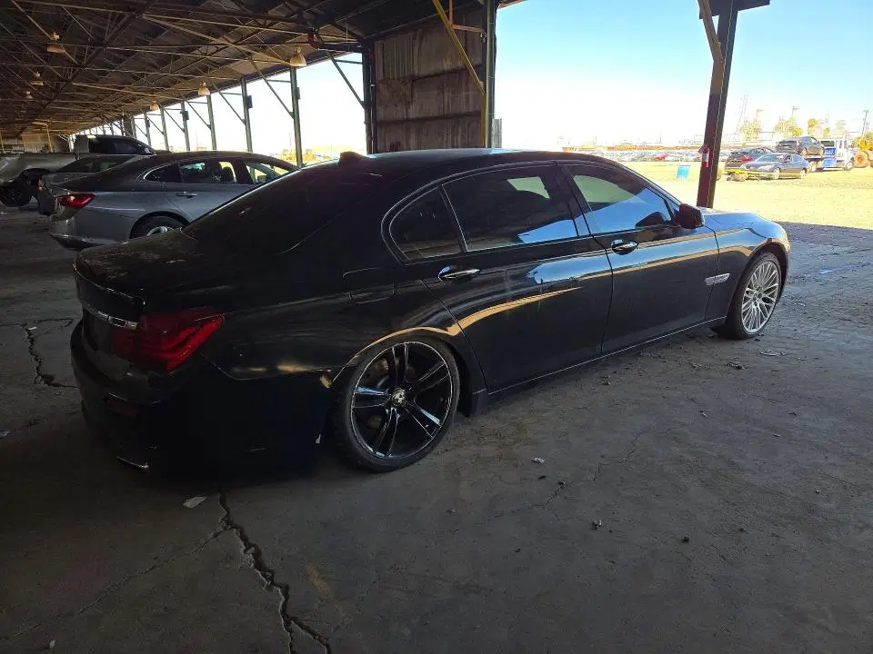2014 BMW 740 VIN WBAYE4C50ED138024 фото 3
