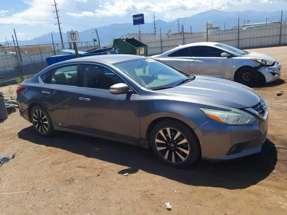 2018 Nissan Altima VIN 1N4AL3AP3JC125265 фото 4