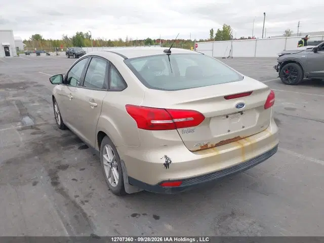 2017 Ford Focus VIN 1FADP3F21HL320886 фото 3
