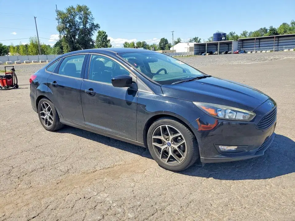 2018 Ford Focus VIN 1FADP3FE6JL313805 фото 4
