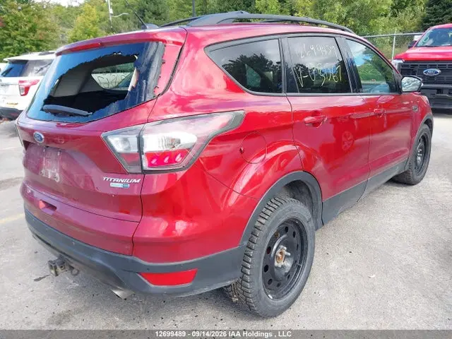 2017 Ford Escape Titanium VIN 1FMCU9J9XHUB31567 фото 4