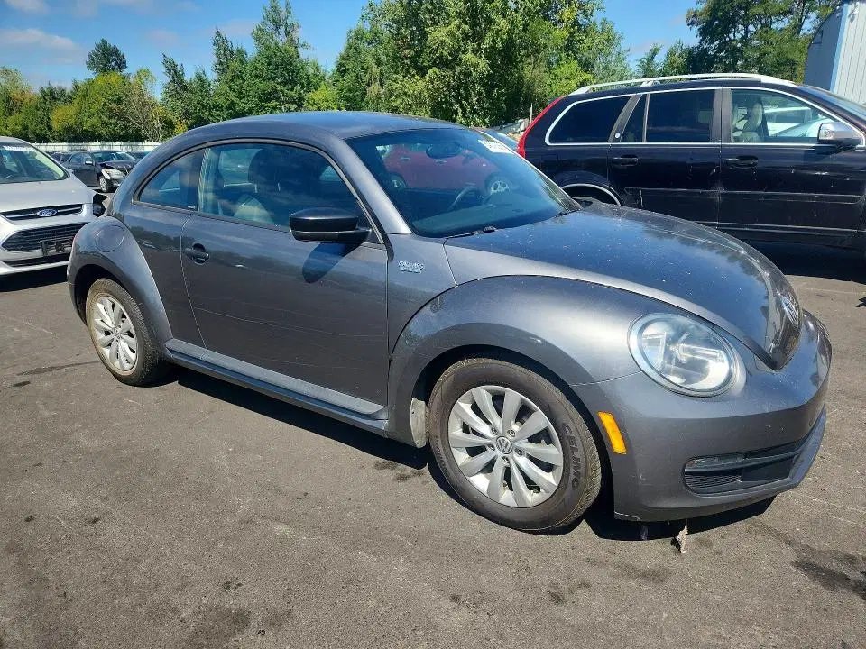 2014 Volkswagen Beetle VIN 3VWF17AT6EM634388 фото 4
