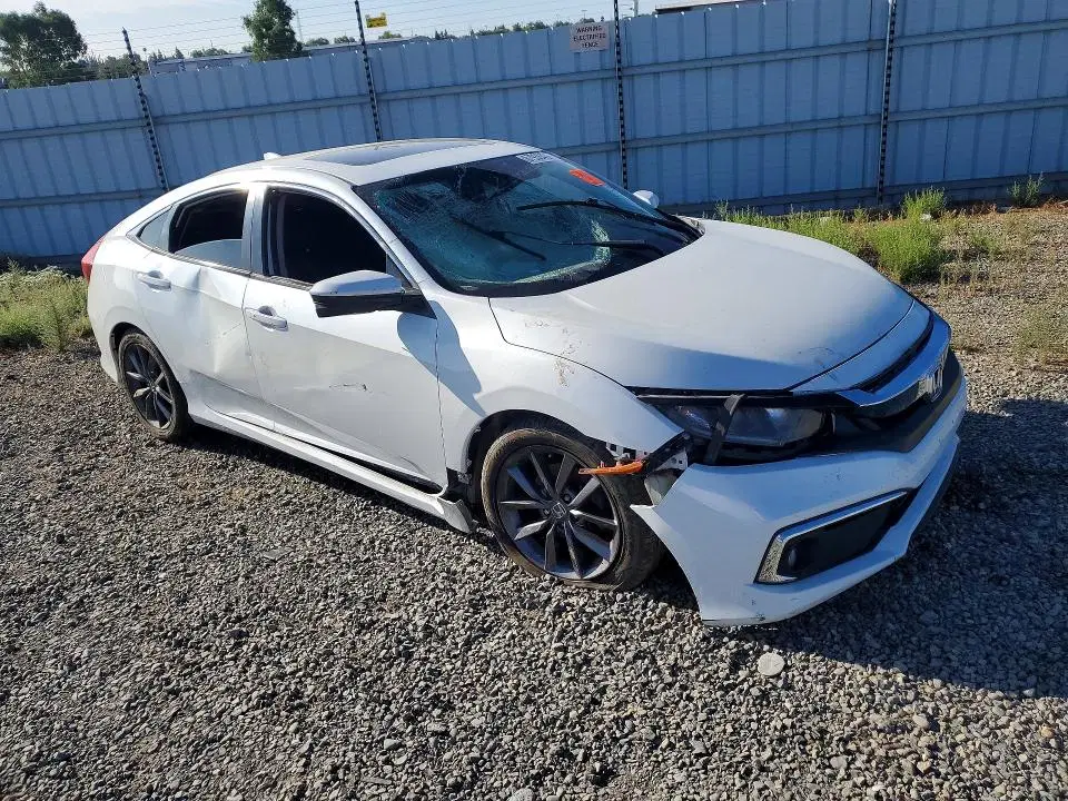 2020 Honda Civic VIN 19XFC1F33LE214131 фото 4
