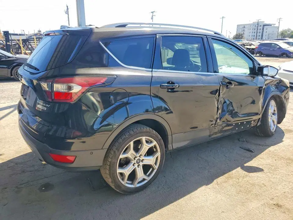 2017 Ford Escape VIN 1FMCU0J93HUC80253 фото 3