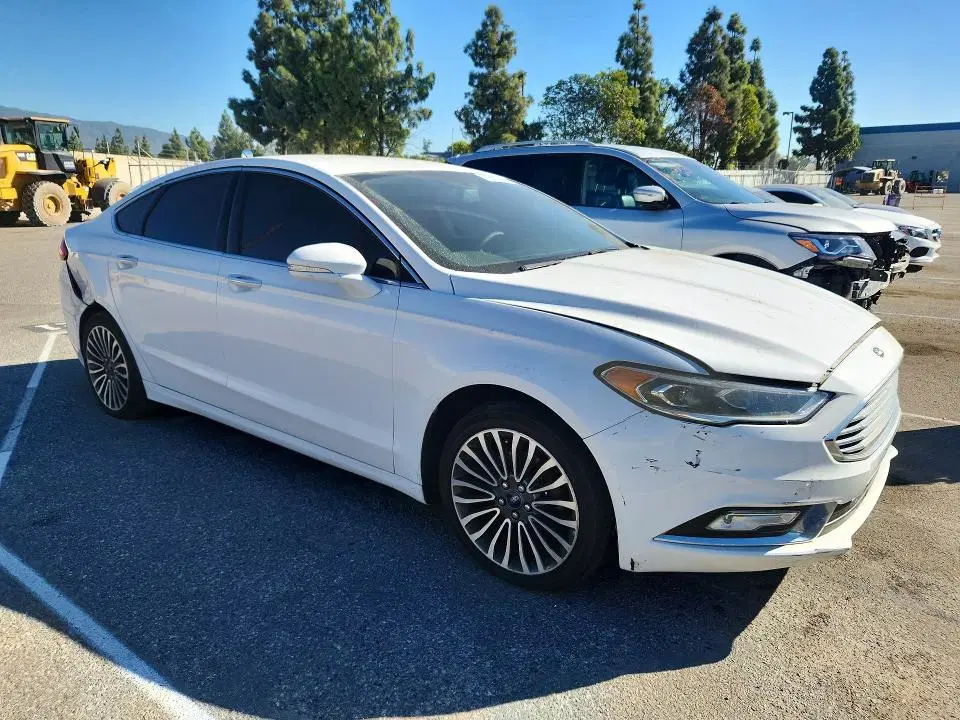 2017 Ford Fusion VIN 3FA6P0H94HR112584 фото 4