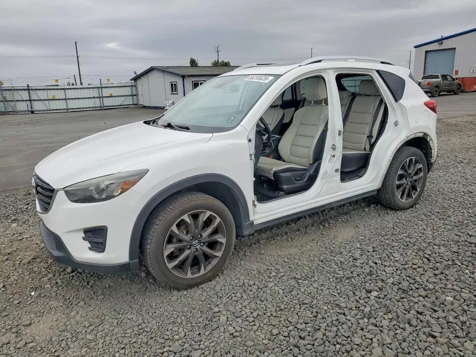 JM3KE4DY3G0697389 — 2016 Mazda CX-5, Боковая часть, фото до ремонта