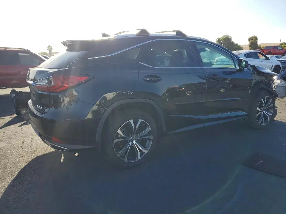 2020 Lexus RX VIN 2T2HZMDAXLC255974 фото 3