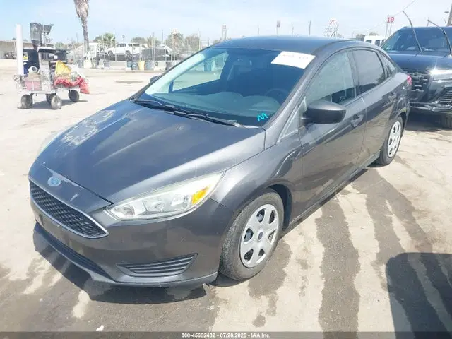 2016 Ford FOCUS S VIN 1FADP3E25GL275953 фото 2