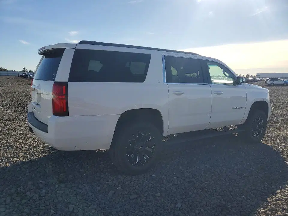 2015 Chevrolet Suburban VIN 1GNSKJKC8FR553328 фото 3