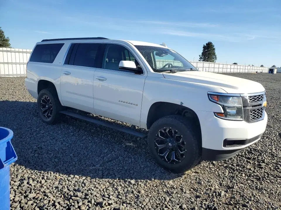 2015 Chevrolet Suburban VIN 1GNSKJKC8FR553328 фото 4