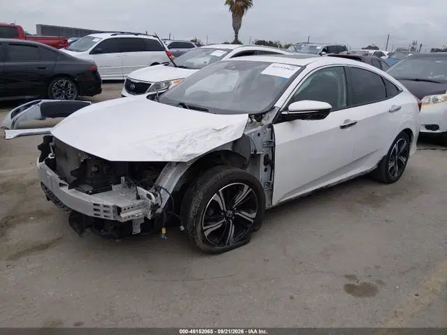 2017 Honda Civic Touring VIN 19XFC1F90HE210713 фото 2