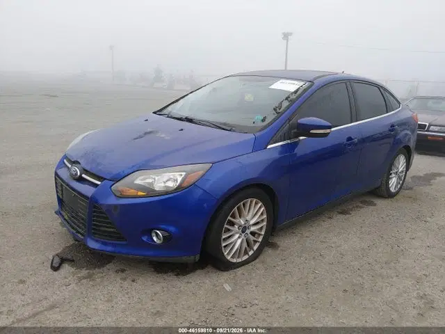 2014 Ford Focus Titanium VIN 1FADP3J24EL312249 фото 2