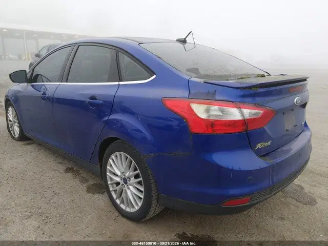 2014 Ford Focus Titanium VIN 1FADP3J24EL312249 фото 3