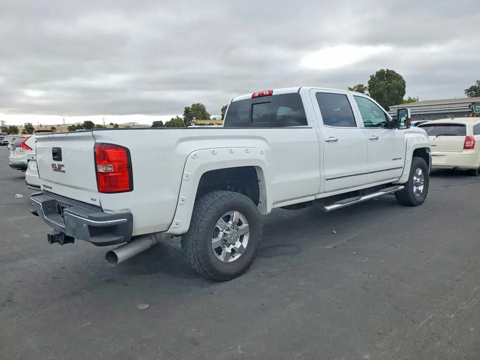 2015 GMC Sierra VIN 1GT423E8XFF597854 фото 3