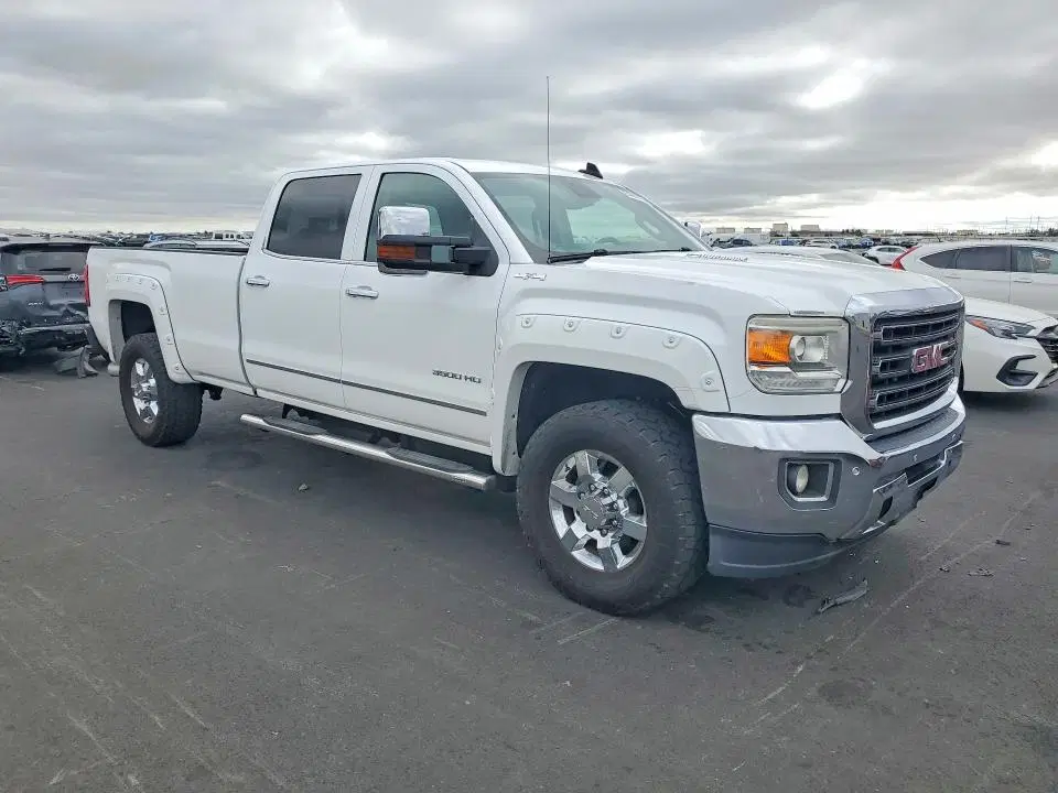 2015 GMC Sierra VIN 1GT423E8XFF597854 фото 4