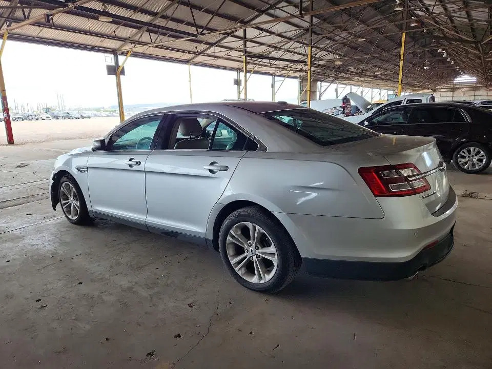 2014 Ford Taurus VIN 1FAHP2E86EG100472 фото 2