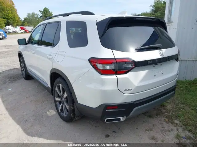 2023 Honda Pilot Touring VIN 5FNYG1H70PB500774 фото 3